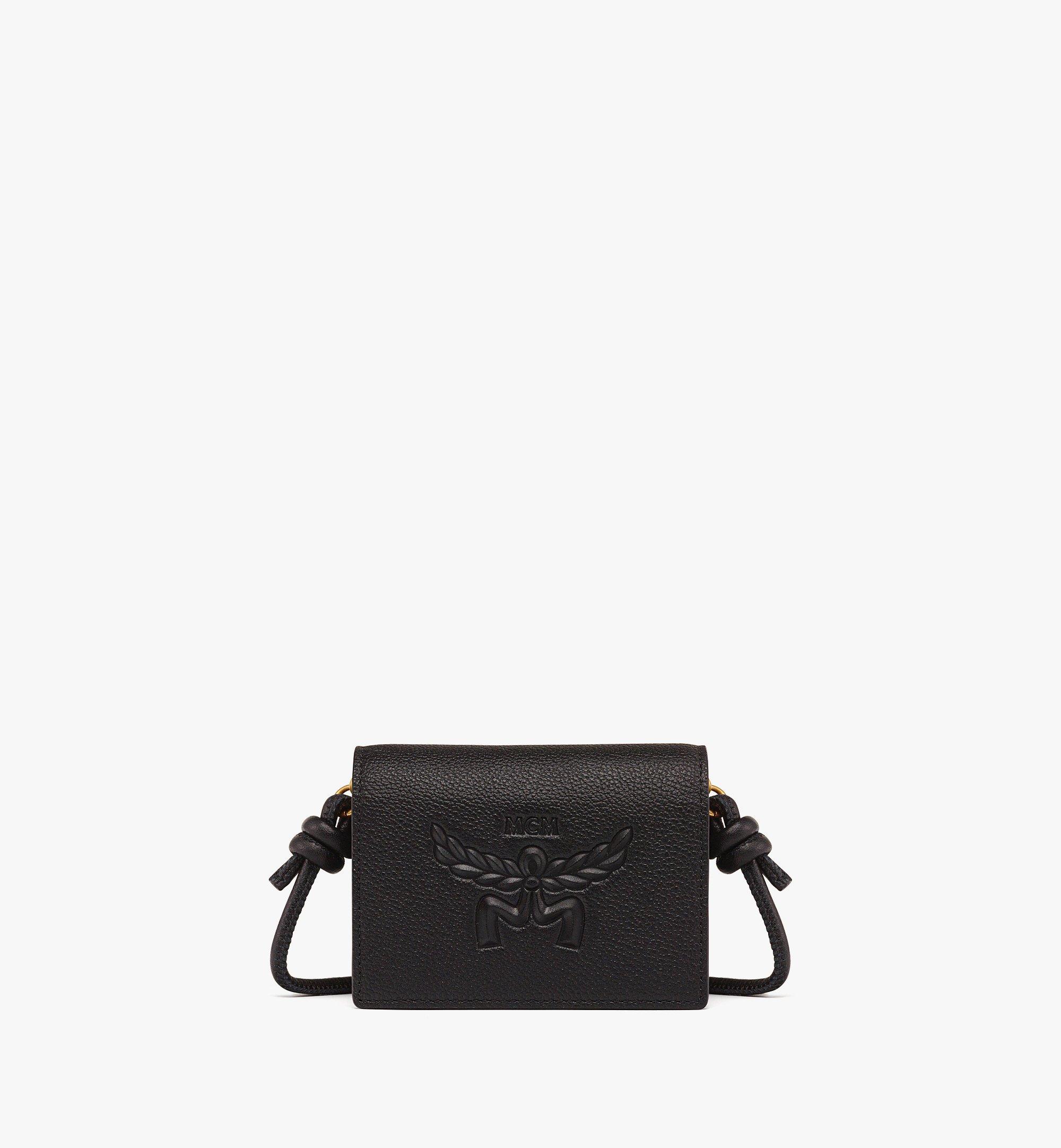 Mcm small leather on sale goods